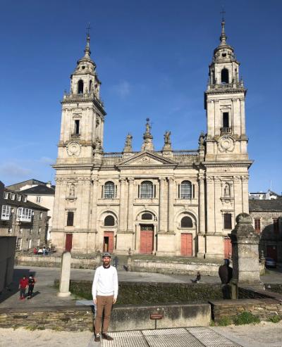 A picture of Will Corvin in front of Saint Mary's Cathedral in Lugo.